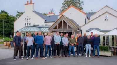 Brave crew: the firefighters who fought the fire that destroyed the Tap & Run in 2022. (Harry Gurney, centre, with blue shirt)